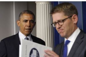 Obama looks upset and Carney looks pissed off!
